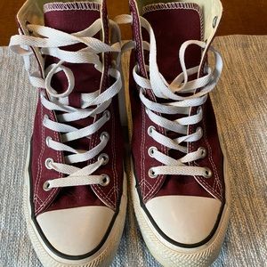 Very good condition burgundy Converse high tops. Women’s size 8.5.